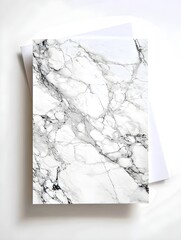 Send Greetings with a Luxurious Marble Textured Greeting Card Placed Against a Pristine White Background