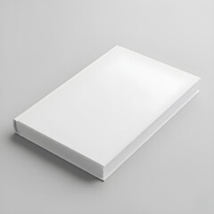 A blank, white hardcover book lying on a light gray background, showcasing its smooth, clean design.