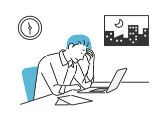 残業で疲労がたまっているビジネスマン