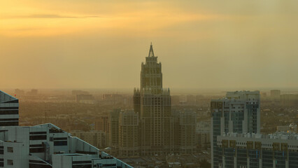 Triumph of Astana building timelapse at sunset time from the top of Baiterek tower. Astana, Kazakhstan