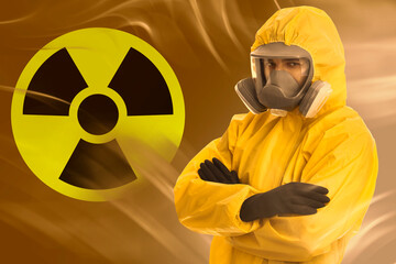 Man wearing hazmat suit and gas mask in smoke. Radioactive sign on orange gradient background