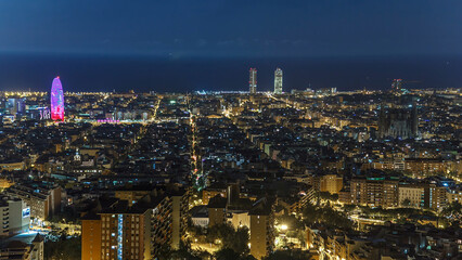 View of Barcelona timelapse, the Mediterranean sea, The tower Agbar and The twin towers from Bunkers Carmel. Catalonia, Spain.