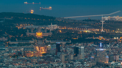 Top view from tibidabo of National Art Museum timelapse at Placa Espanya in Barcelona day to night, Catalonia, Spain