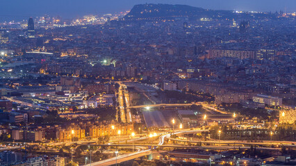 Barcelona and Badalona skyline with roofs of houses and sea on the horizon day to night timelapse