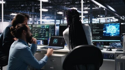 Data center software developers using machine learning algorithms to analyze large datasets. Server hub IT experts cooperating, using AI neural networks to recognize data patterns, camera A - Powered by Adobe
