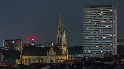 Aerial timelapse of Saint Servatius Church at night in Schaerbeek, Brussels, Belgium.