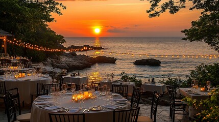 Seaside dinner setting at sunset with string lights.
