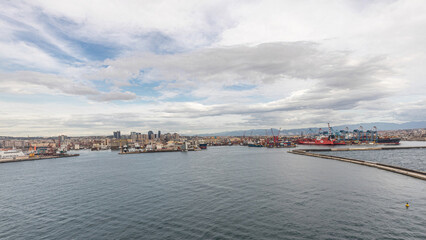 Aerial view of sea with waves and port from ship sailing in the open sea timelapse
