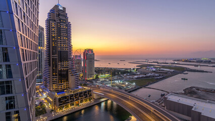 Fototapeta premium JBR and Dubai marina after sunset aerial day to night timelapse