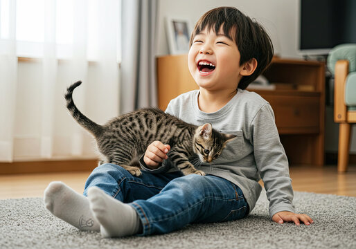 Child and Kitten Playtime. Joyful Moments. Furry Fun with a Tiny Friend. August 8 International Cat Day