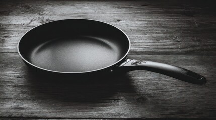 Empty Frying Pan on Rustic Wooden Table