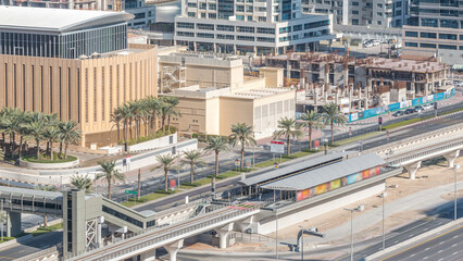 Aerial view of Dubai Tram in Dubai marina timelapse.