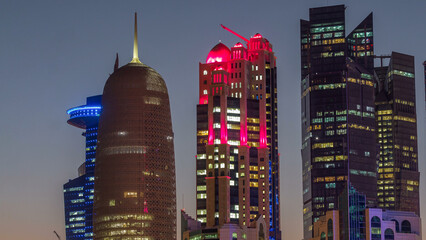The high-rise district of Doha day to night timelapse after sunset
