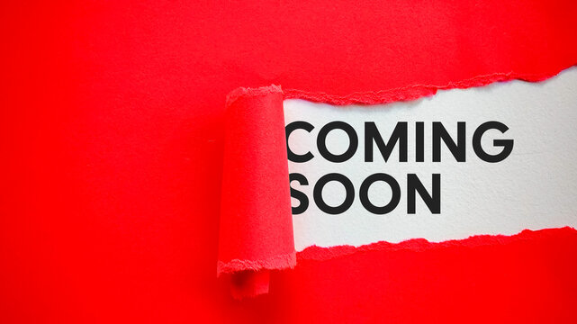 Coming Soon Message Revealed Under Torn Red Paper on White Background