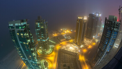 The skyline of the West Bay area from top in Doha day to night timelapse, Qatar.