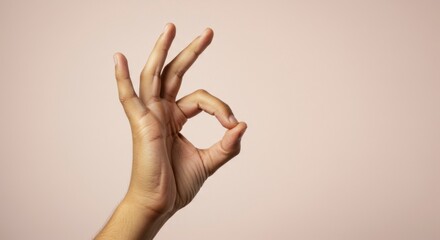 Hand making OK sign