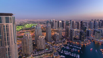 Dubai Marina with yachts day to night aerial timelapse