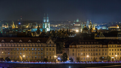 Obraz premium Night Panorama of Prague with Vltava river timelapse.