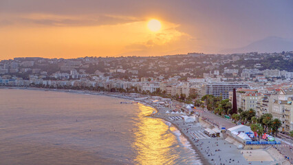 Sunset over Nice city and Mediterranean Sea aerial timelapse