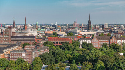 Aerial timelapse of Hamburg's historic city center skyline with iconic towers and spires. Germany