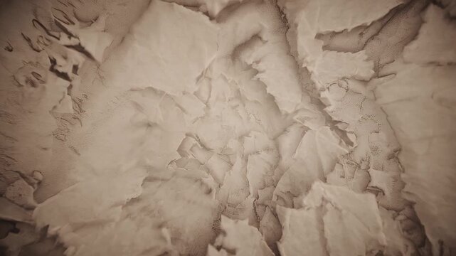 Add authentic vintage video character through looping 4K stop motion weathered paper texture subtle stains grain dust flickering lending torical depth to title cards documentary overlays diary style