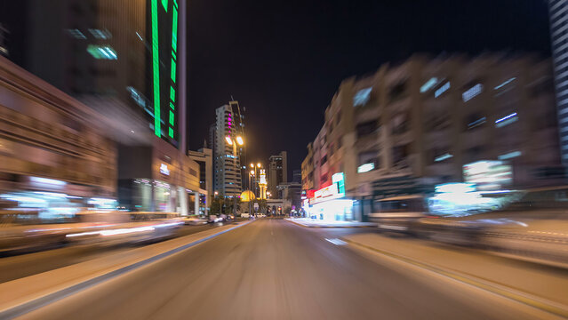 Drive through the traffic in the city highway timelapse hyperlapse in Kuwait. Kuwait, Middle East - Powered by Adobe