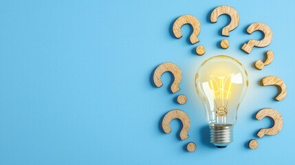 A light bulb illuminating questions in a creative layout, symbolizing ideas and curiosity. The background is a calming blue, enhancing the focus on the central theme of inquiry.
