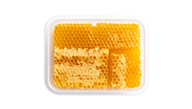 Close up of Honeycomb in Plastic Box, Isolated on Transparent Background