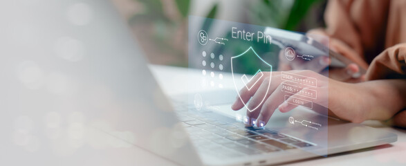 Hand typing password on laptop with virtual login interface, symbolizing cyber security, data...