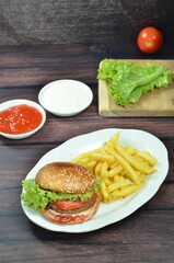 Beef burger with French fries, fresh made and tasty