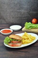 Beef burger with French fries, fresh made and tasty