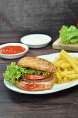 Beef burger with French fries, fresh made and tasty