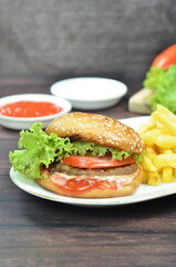 Beef burger with French fries, fresh made and tasty
