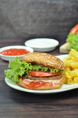 Beef burger with French fries, fresh made and tasty