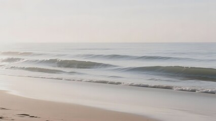 Gentle waves rolling onto a sandy beach under a clear sky
