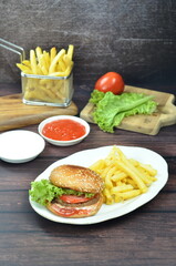 Beef burger with French fries, fresh made and tasty