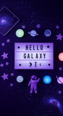 Cute space-themed flatlay with “Hello Galaxy” lightbox