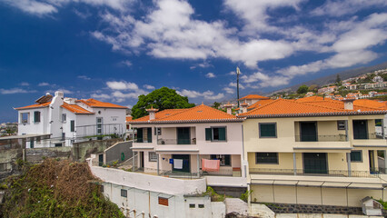 Aerial view from the mountain over the rooftops from cable car on Madeira timelapse hyperlapse.