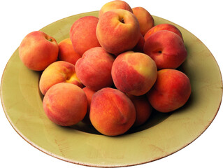 A vibrant pile of ripe fuzzy peaches artfully arranged in a light green ceramic bowl isolated on...