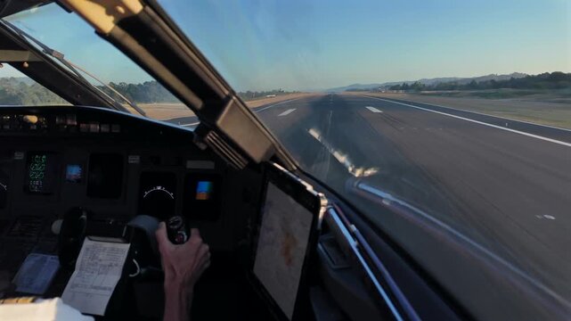 A pilot&rsquo;s FPV perspective in a real time landing at the golden hourin in a short runway surrounded by trees in an isoloated airport.