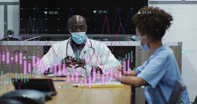 Doctor and nurse discussing medical data after animated candlestick charts appearing on laptop
