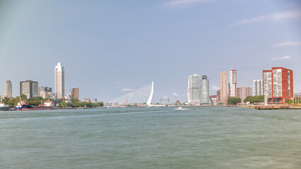 Fototapeta premium Timelapse of Erasmus Bridge, called The Swan, spanning the Maas River in Rotterdam, Netherlands.