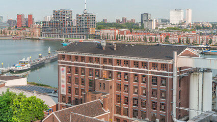 Fototapeta premium Aerial timelapse view over Maashaven with Katendrecht and Maas River. Netherlands