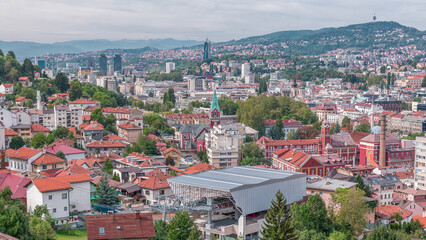 City panorama with cable car moving up and down from Sarajevo station to mountains, Bosnia And...