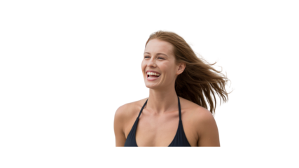 Joyful Woman with Windblown Hair Laughing on Beach Vacation