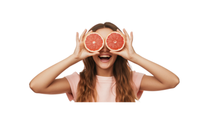 Playful Young Woman Covering Eyes with Grapefruit Slices