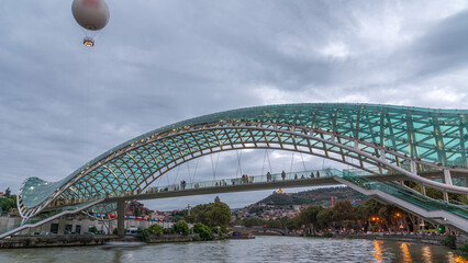 Timelapse of the Bridge of Peace, a bow-shaped pedestrian bridge in Tbilisi, Georgia