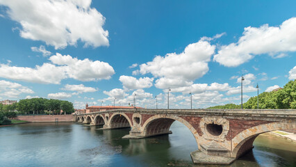 Fototapeta premium Garonne River and Pont Neuf timelapse hyperlapse in downtown Toulouse, France