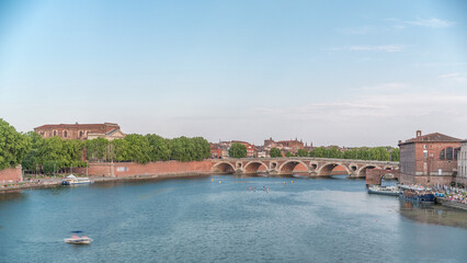 Obraz premium Garonne River and Pont Neuf timelapse in downtown Toulouse, France