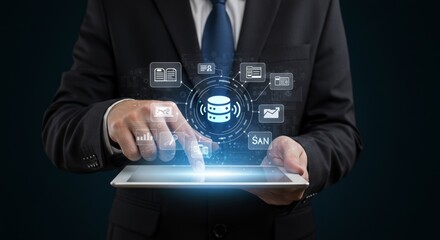 Businessman in a dark suit interacts with a tablet displaying a data cloud with glowing icons. A representation of digital data storage